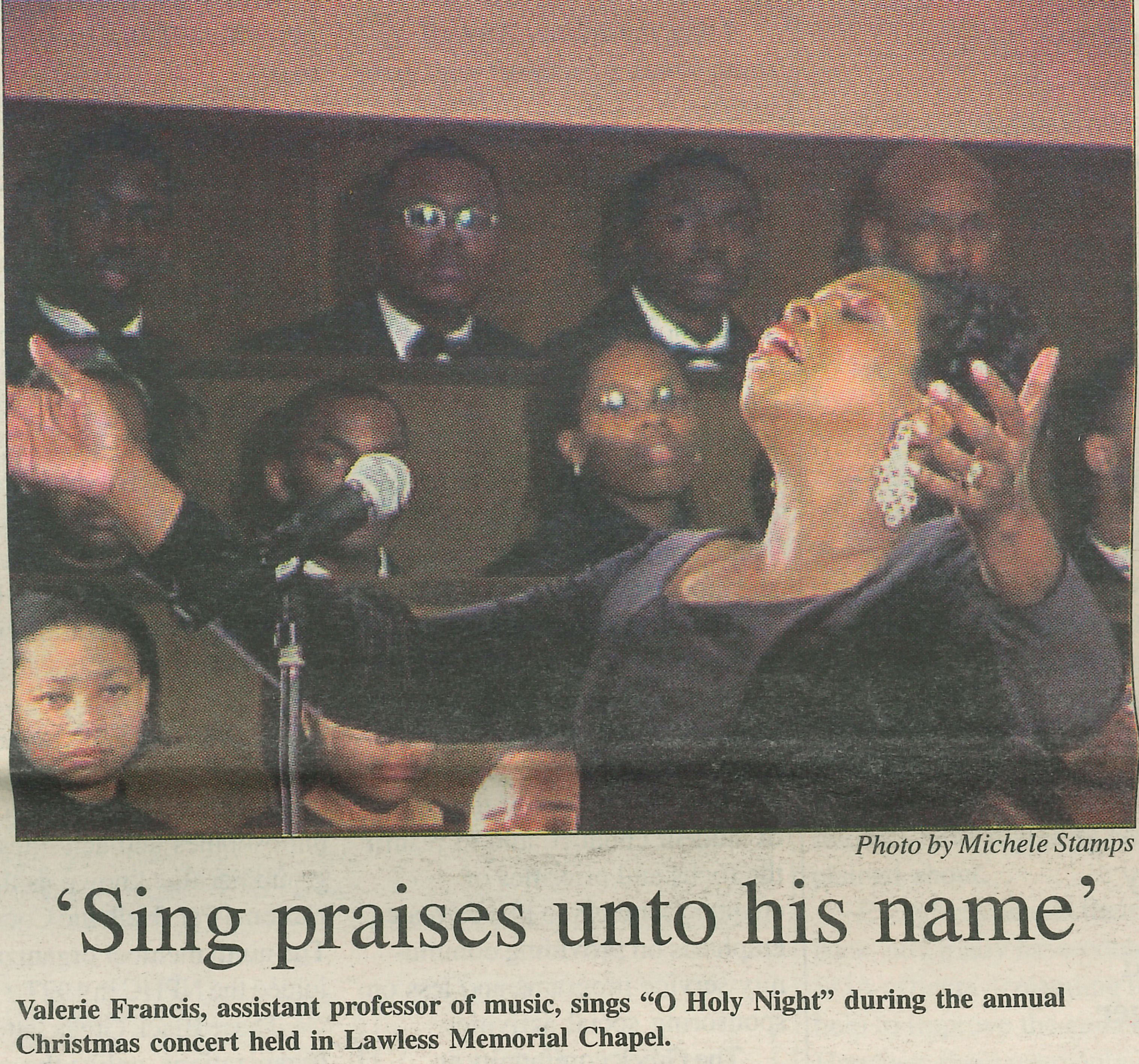 Photo by Michele Stamps: 'Sing praises unto his name'
                                    Valerie Francis, assistant professor of music, sings 'O Holy Night' during the annual Christmas concert held in Lawless Memorial Chapel.